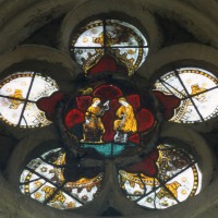 Vitrail d'une rose des fenêtres : Adam bêchant et Eve filant (1997)